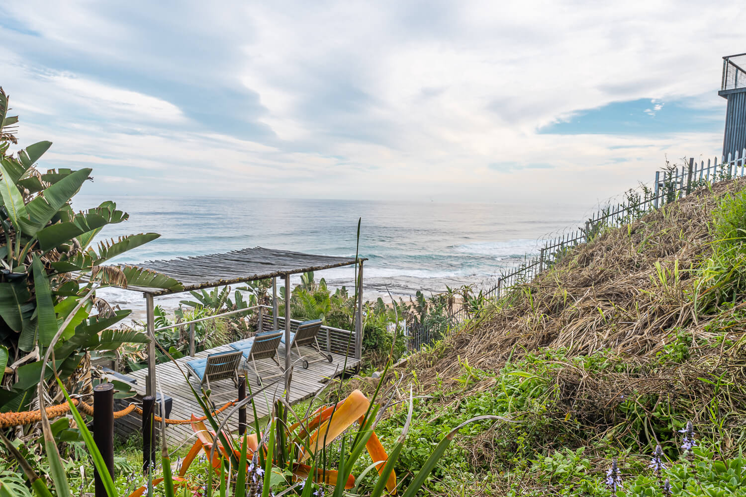 view of pergola and ocean